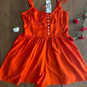 New Urban Outfitters romper. Size M
